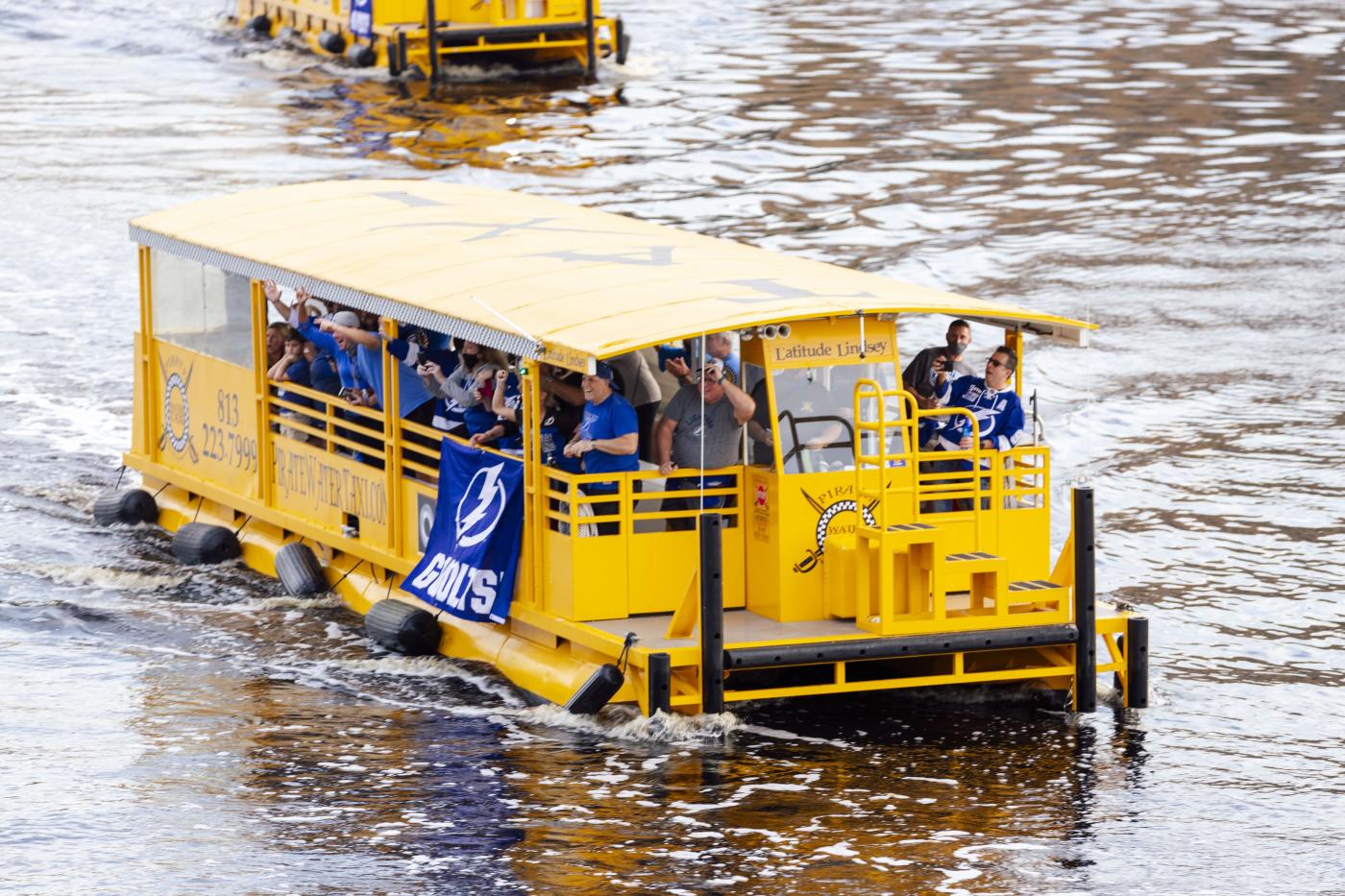 Water Taxi with Lightning flags