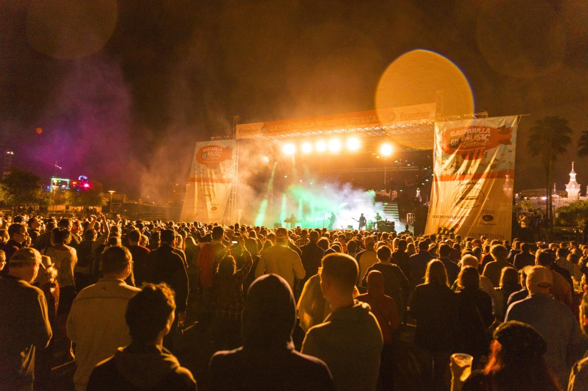 The Gasparilla Music Festival stage glowing orange from stage lights.